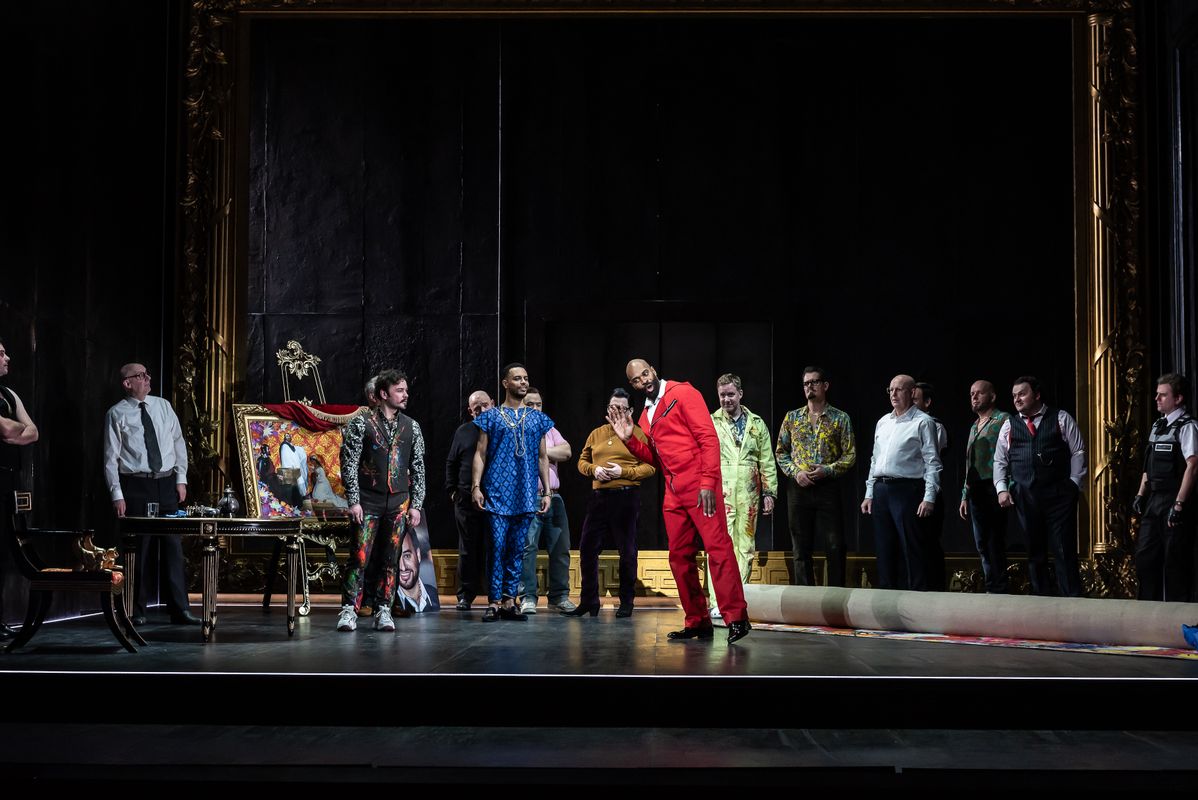Ross McInroy as Count Ceprano, Themba Mvula as Marullo, Eric Greene as Rigoletto and Campbell Russell as Borsa, with the Chorus of Opera North