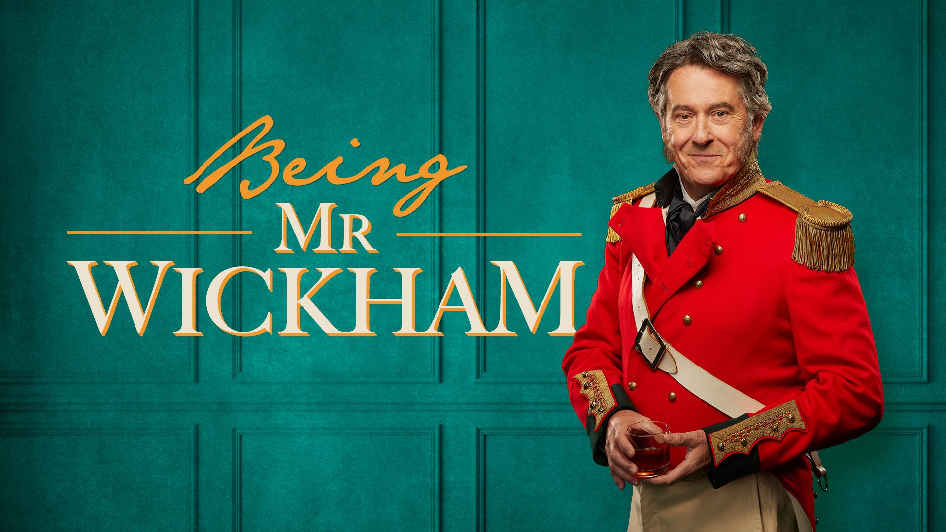 Performer in a red military-style jacket stands before a teal backdrop with show title text.